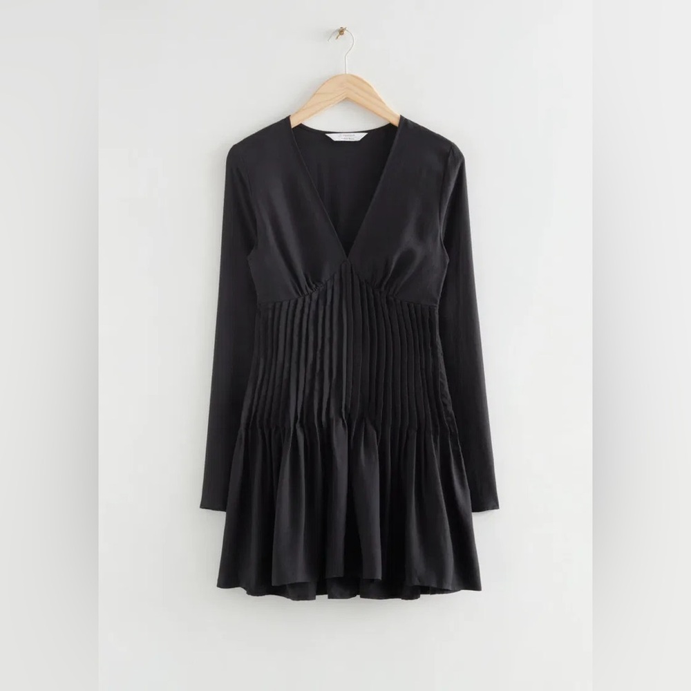 Pleated dress with bell sleeves